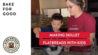 Libby and her son making flatbread