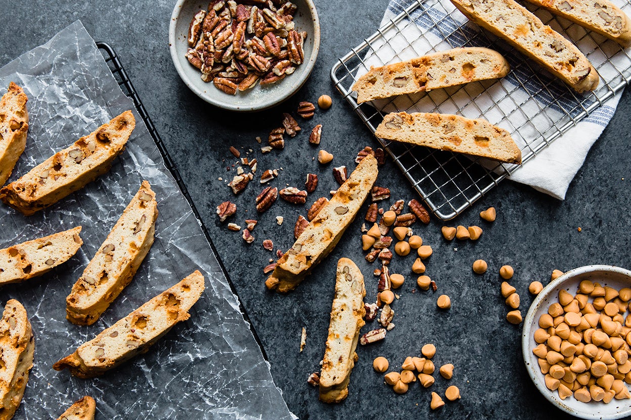 Buttered baking pan for homemade biscotti by bakethiscake