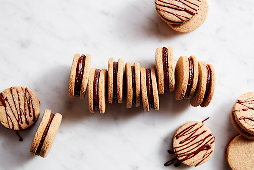 While delicious as a plain and simple shortbread, these cookies are easily transformed into sweet little sandwiches.