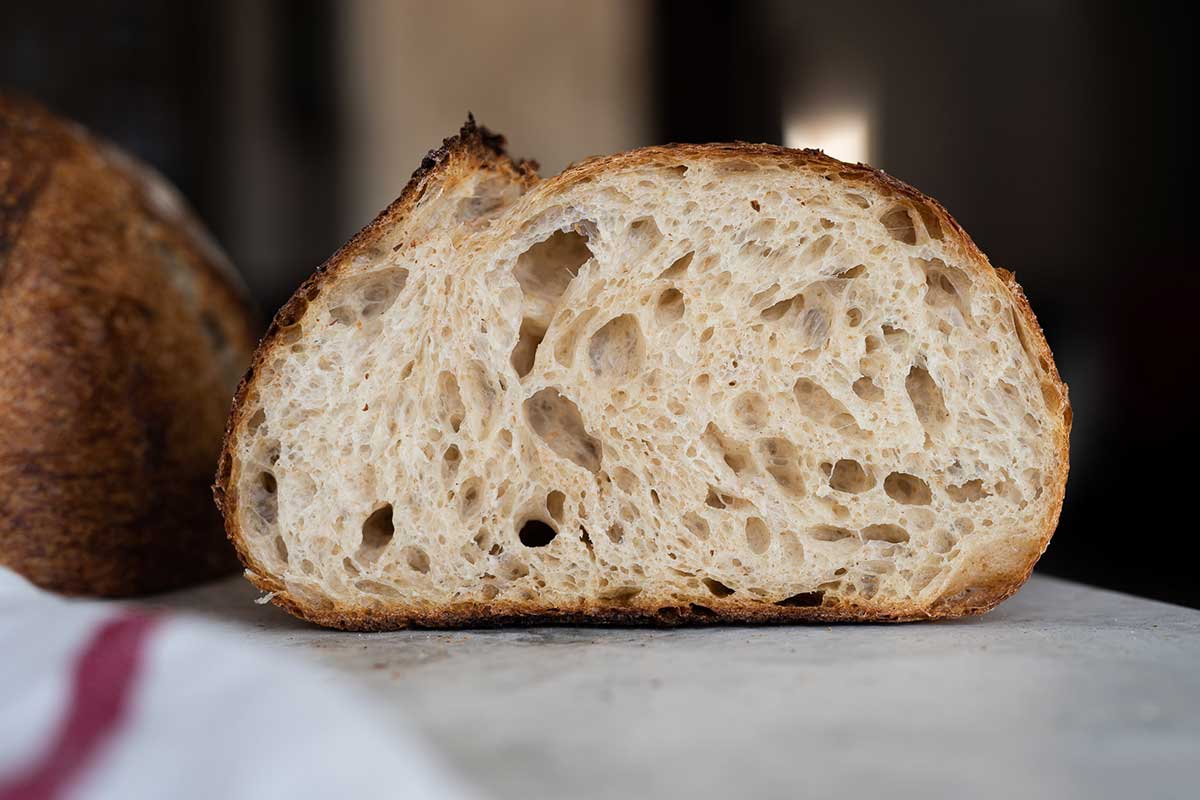 How to produce an open crumb in sourdough bread
