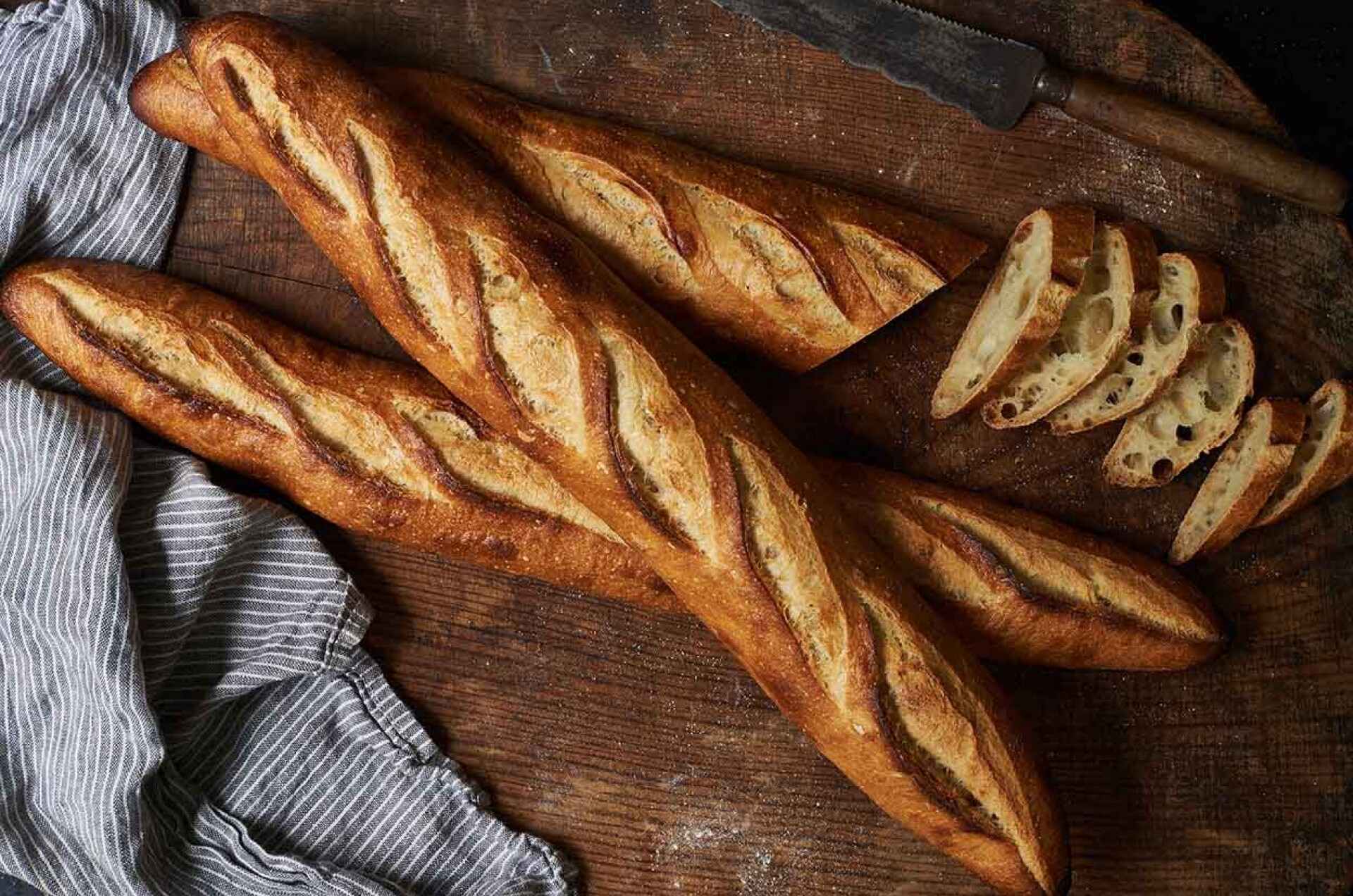 Baguettes The Famous Long And Thin French Bread Close Up Of Some