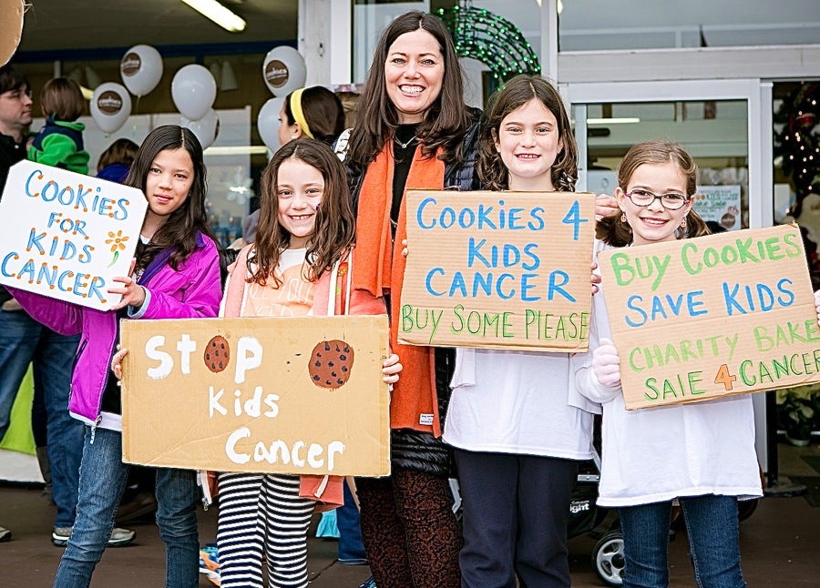 Gretchen and Ella at a bake sale