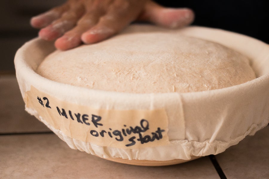 The rise lifted a 777g lid about 2mm. Final loaf weight is 1041g. White  whole wheat, AP and bread flour. Sourdough starter. : r/Sourdough