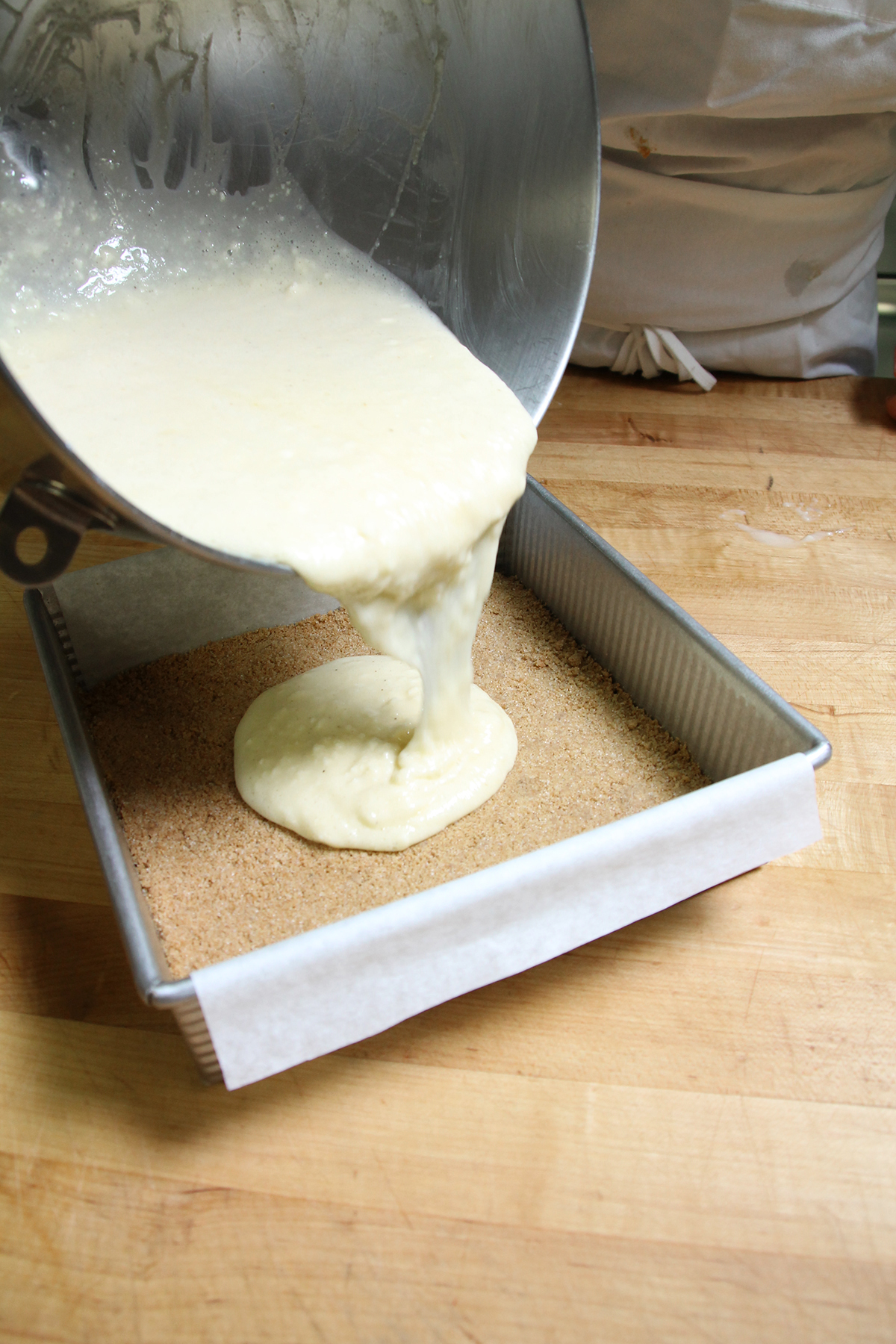 Baking with a parchment paper sling via @kingarthurflour