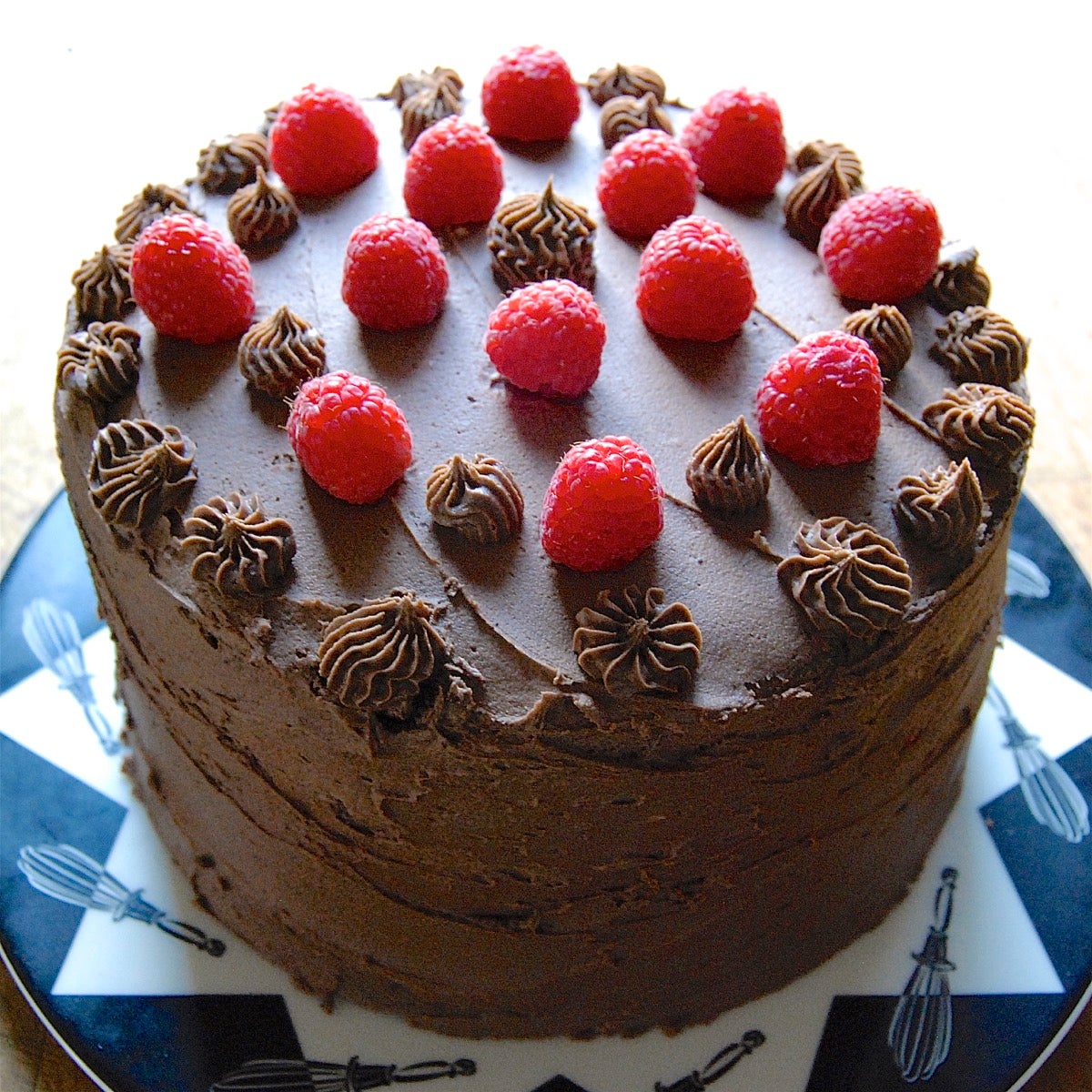 Chocolate Mousse Cake with Raspberries Bakealong via @kingarthurflour