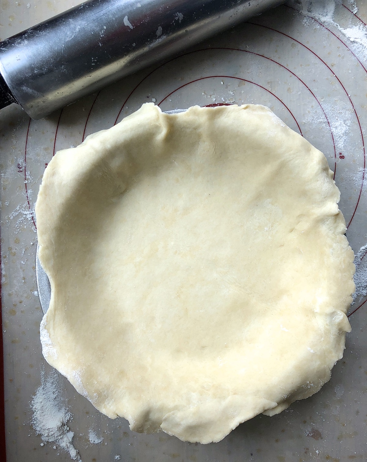 Super-flaky pie crust dough rolled into a bottom crust, placed in pan