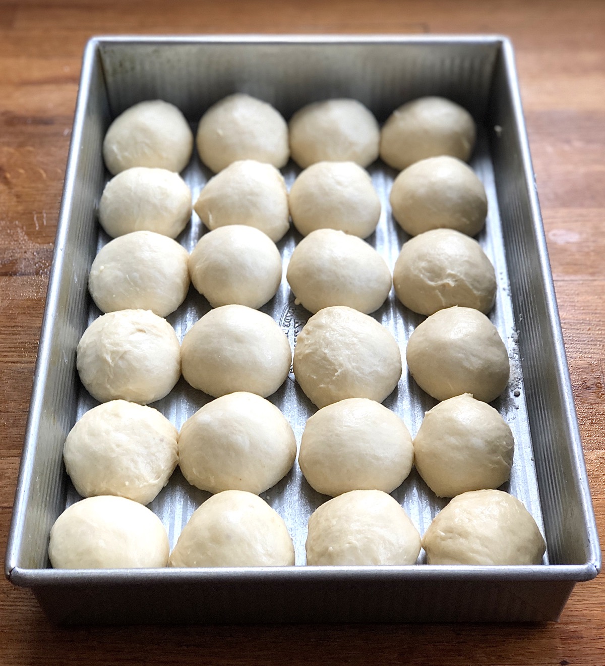 Two dozen Amish Dinner Rolls in a 9" x 13" pan, ready to rise.