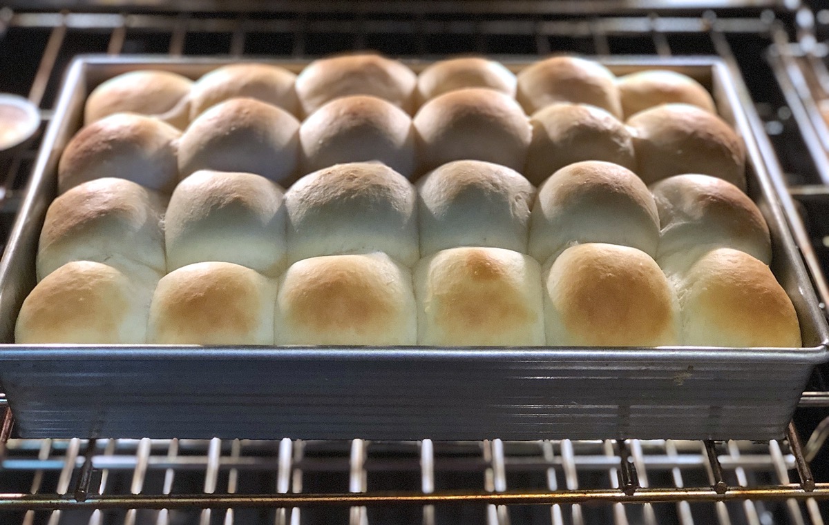 Pan of Amish Dinner Rolls baking in the oven.