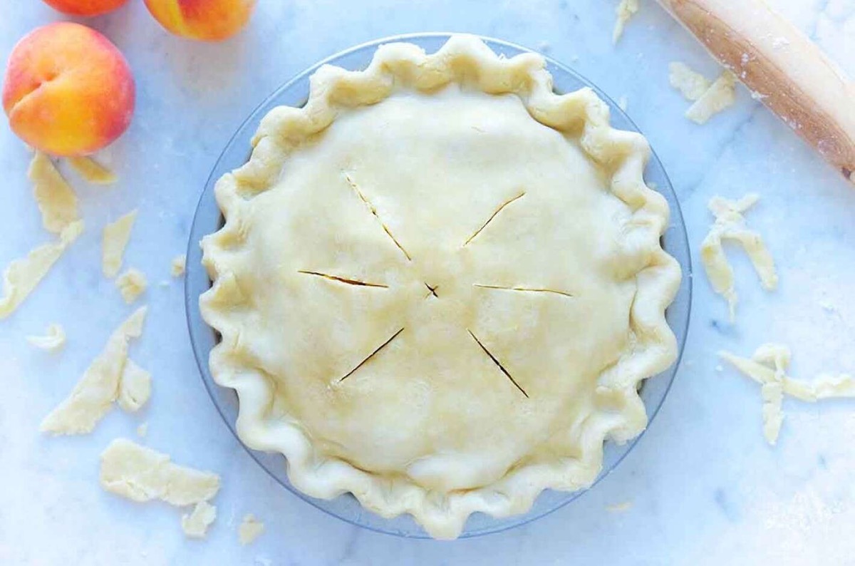 Unbaked pie showcasing its crust.