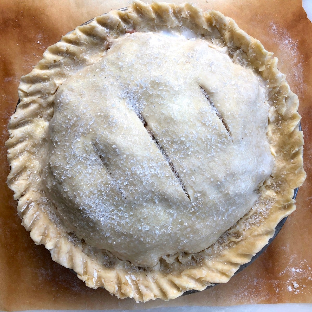 Apple pie made with sourdough crust, ready to go into the oven.