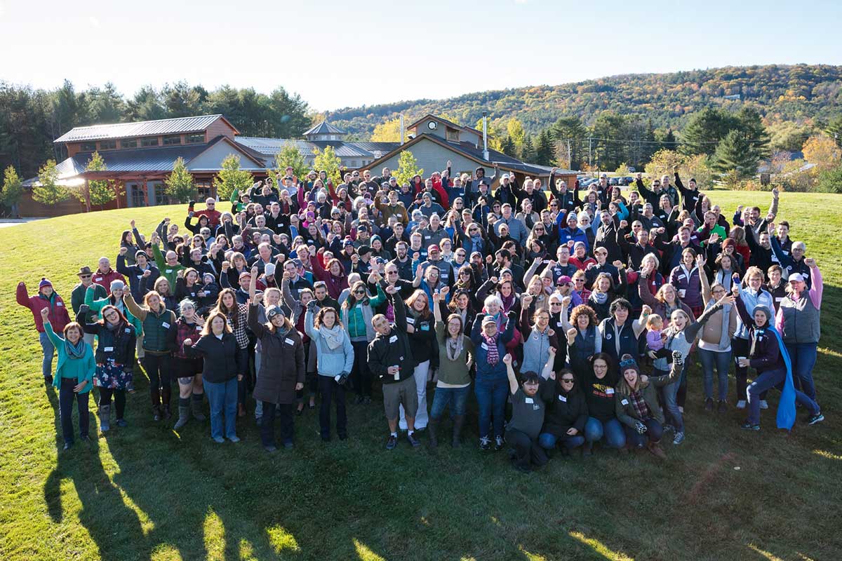 The employee-owners of King Arthur Baking Company standing outside gathered together