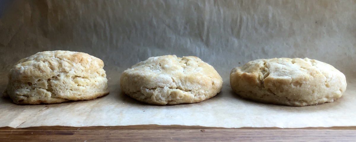 Three biscuits side by side made with three different butters, showing how the one made with dairy butter rose a bit higher.