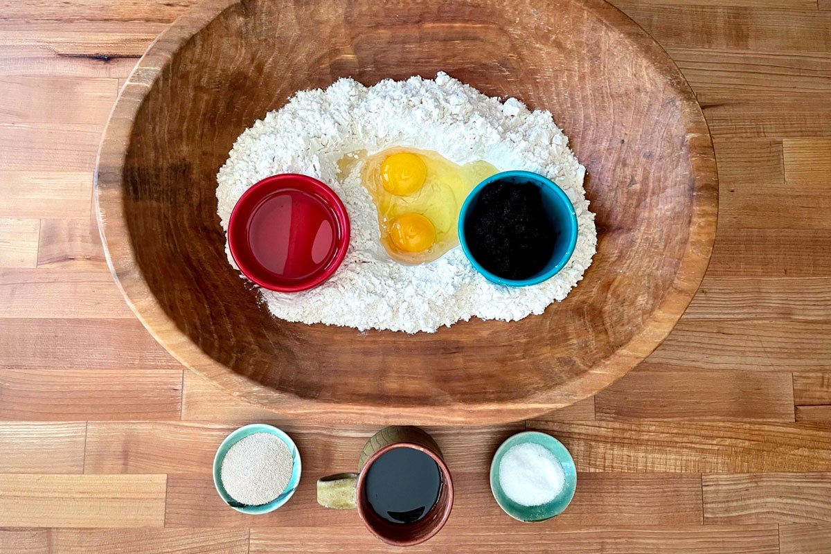 Ingredients to make beet-dyed dough in mixing bowl