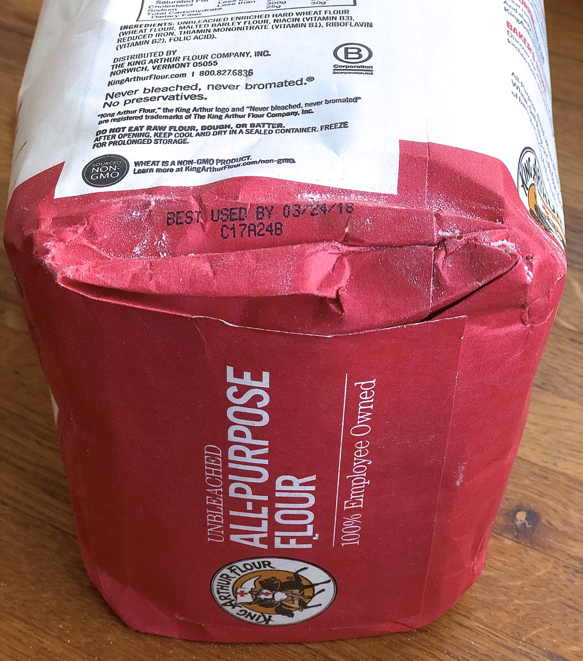 Bag of King Arthur all-purpose flour showing a 2018 best-by date.