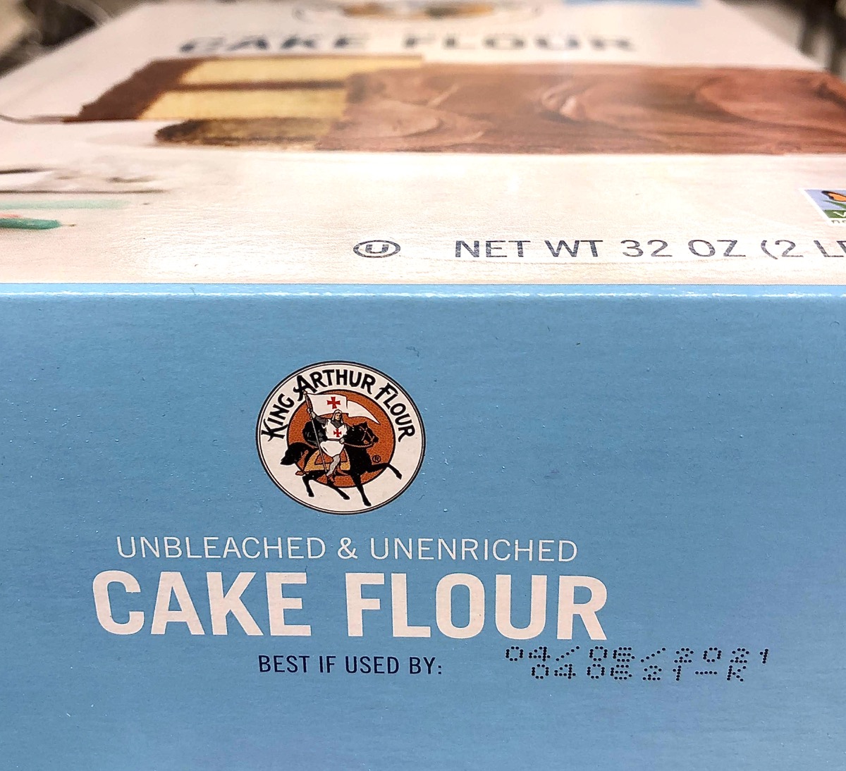 Bottom of box of cake flour showing best if used by date.