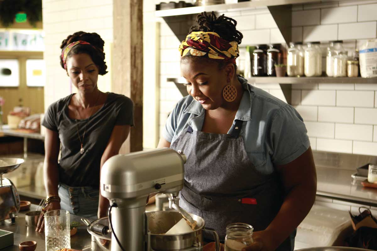 Carla baking with business partner Kathryn