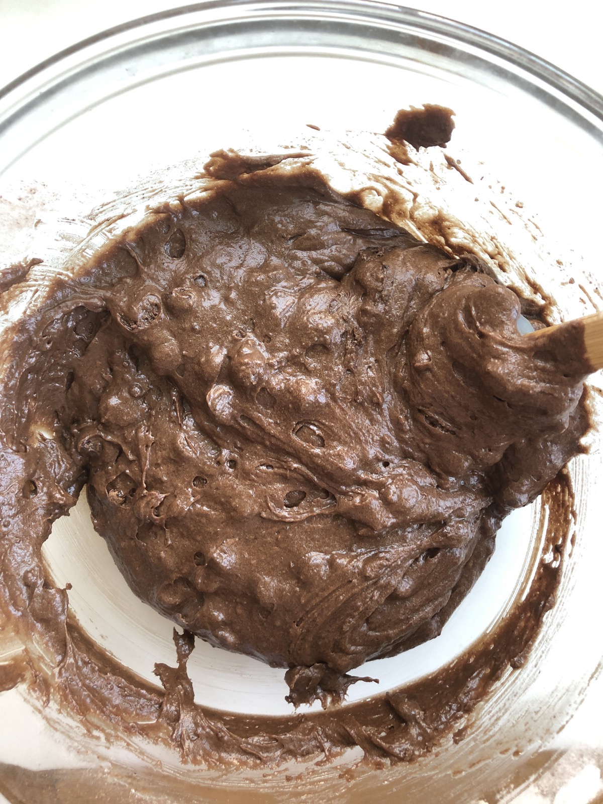 Finished batter for Chocolate Fudge Cake Doughnuts in bowl.