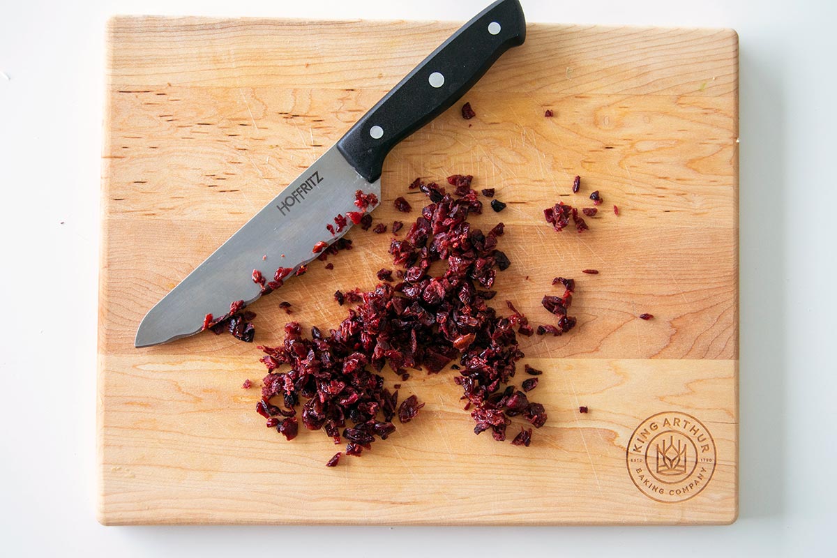 Chopped cranberries on cutting board