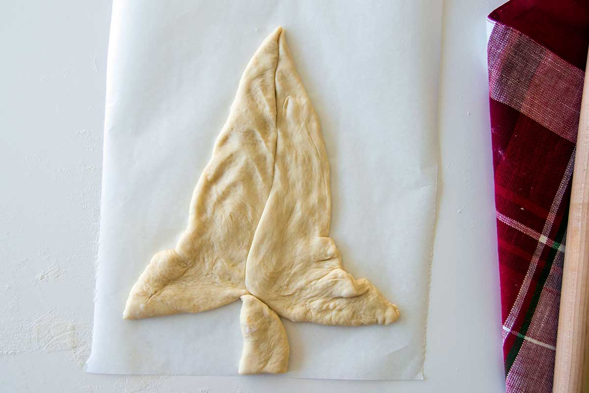 Leftover dough formed into rough Christmas tree shape
