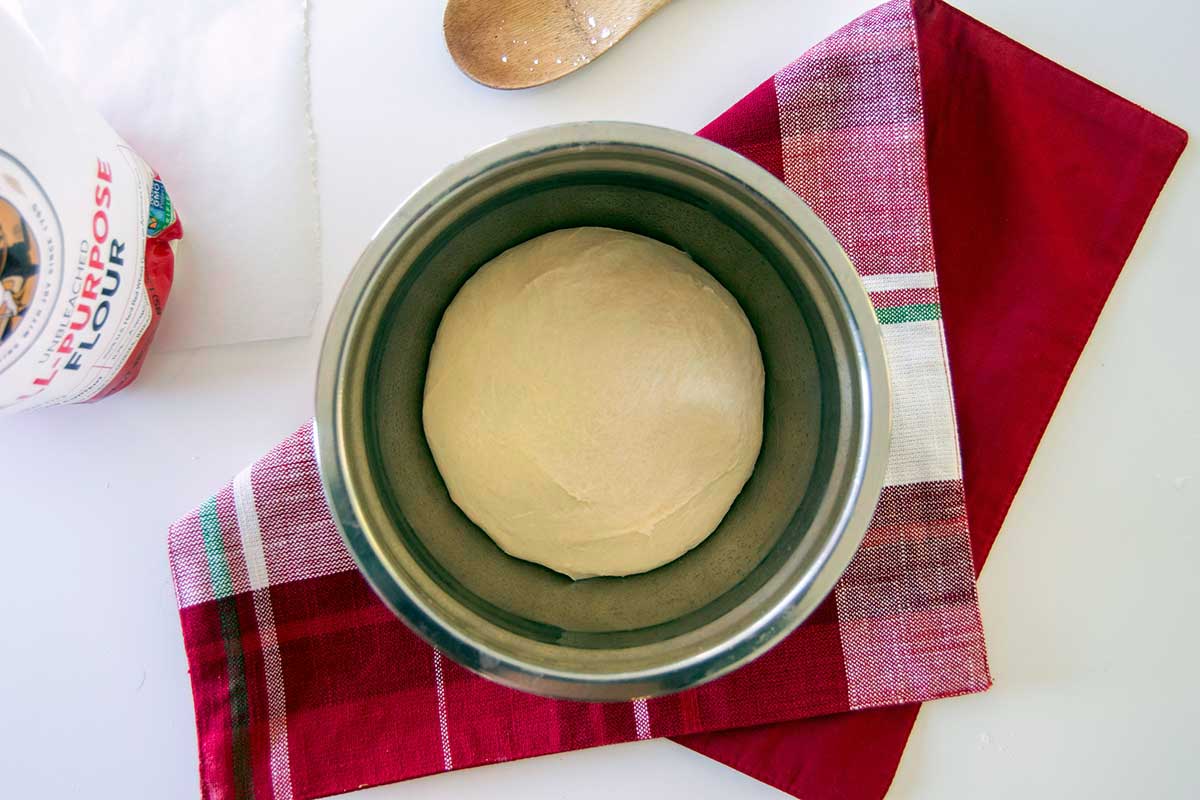 Proofed dough in bowl