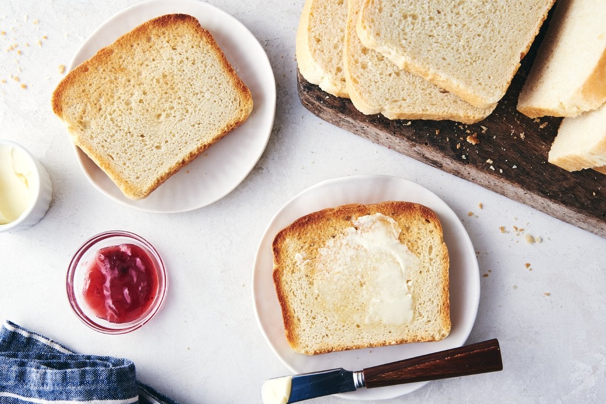 A loaf of salt-rising bread cut into slices and prepared as toast