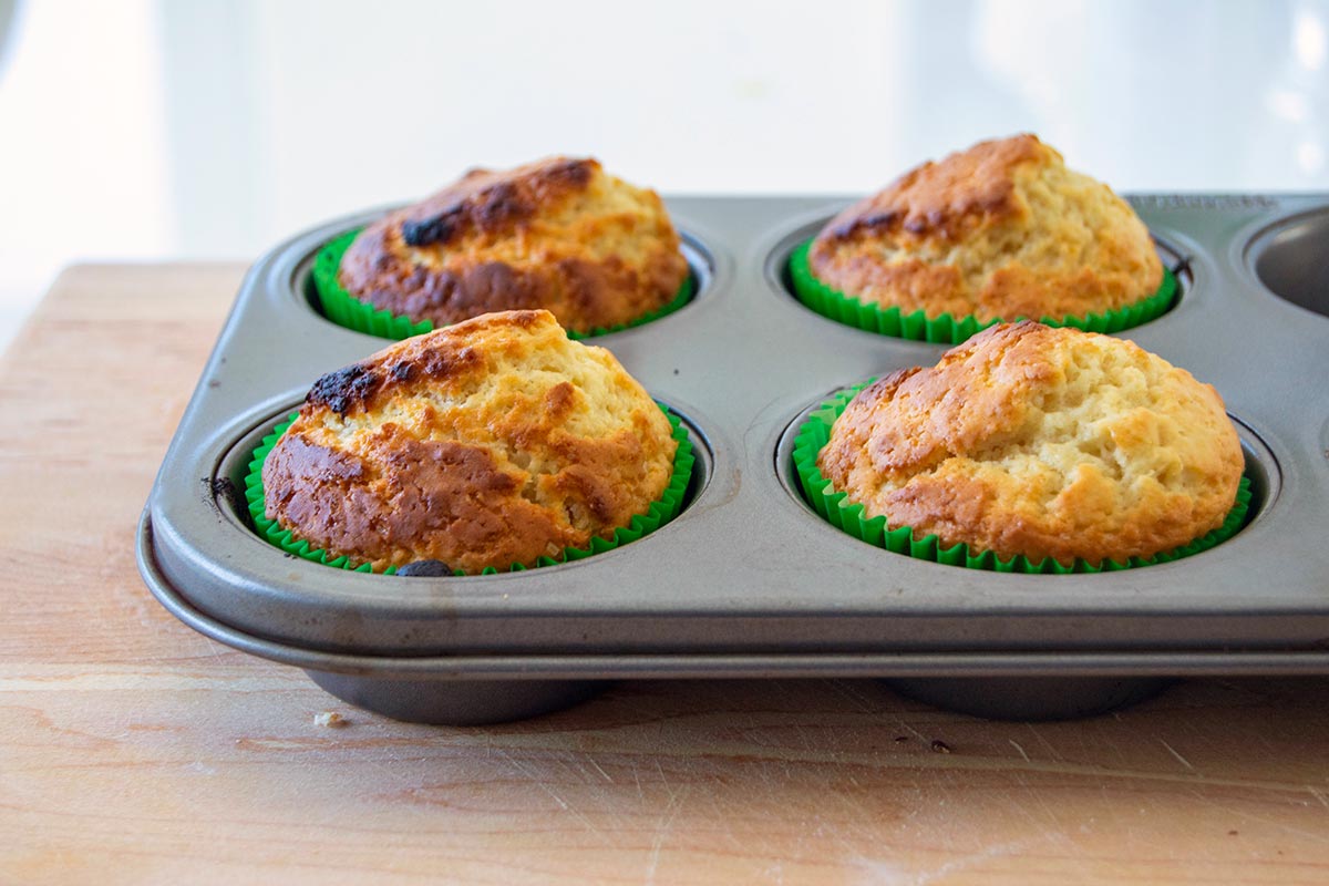 Muffins slanted sideways with dark exterior