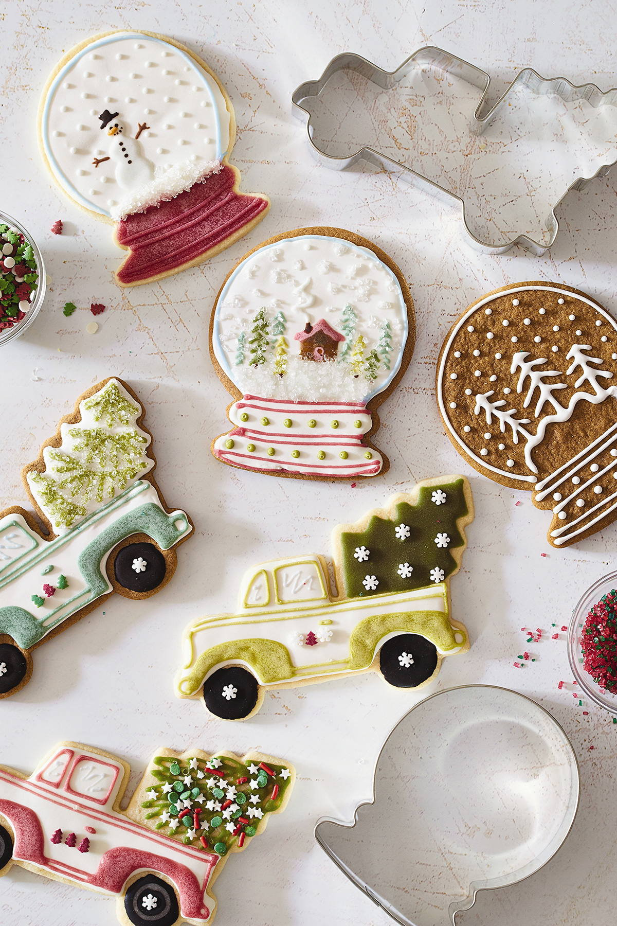 A selection of Christmas cookies decorated with naturally-colored icing