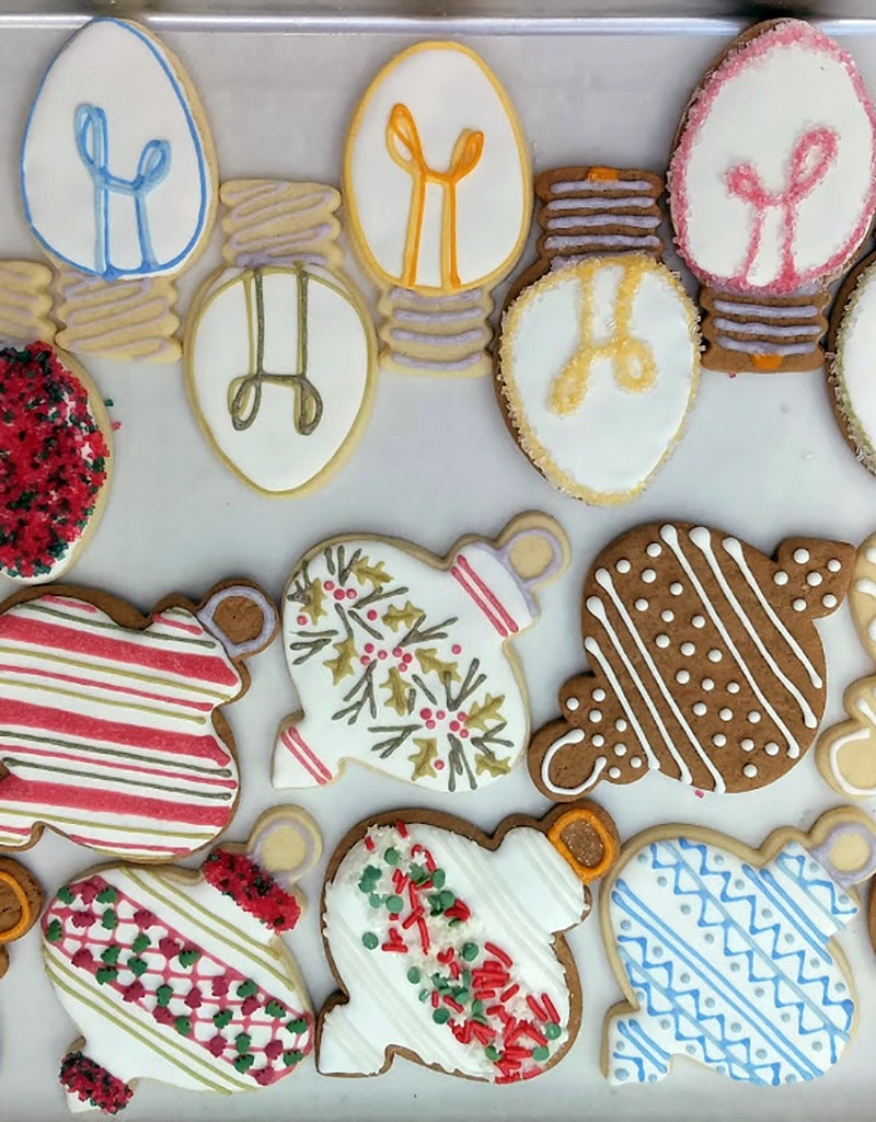 Christmas-theme sugar cookies decorated with natural icing