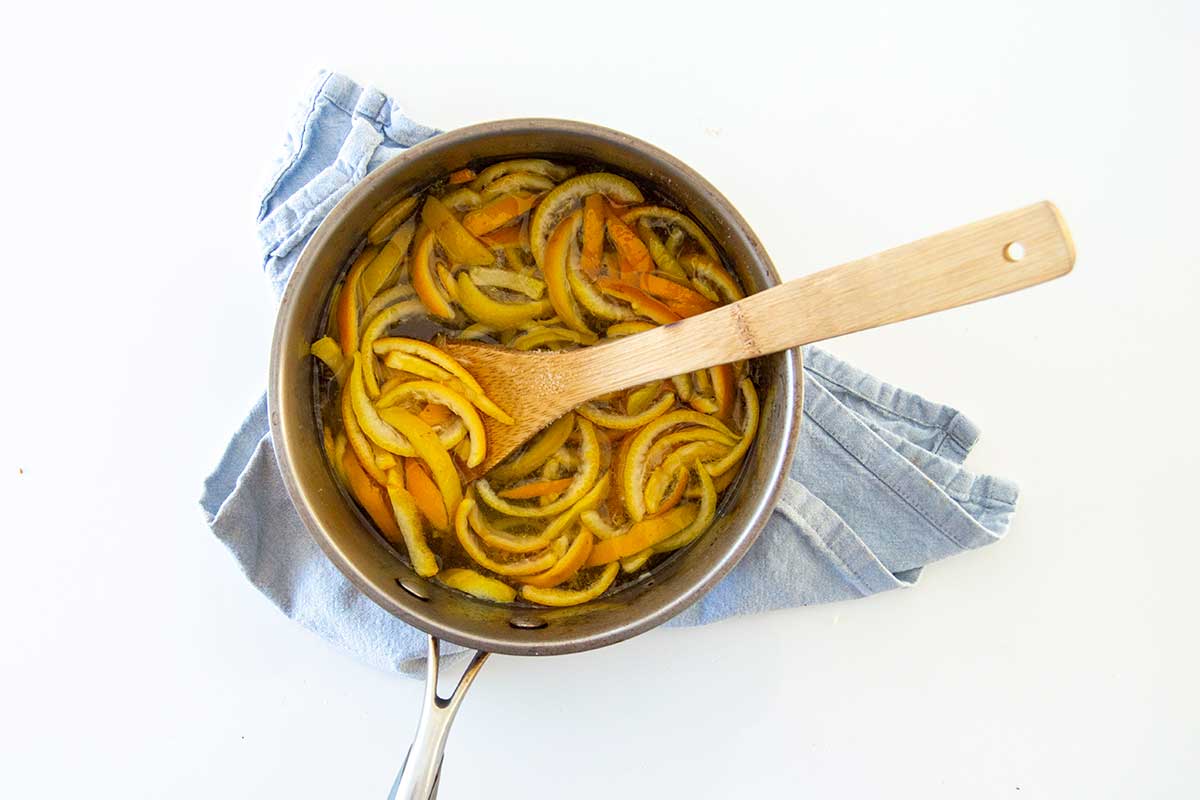 Saucepan with blanched orange peels