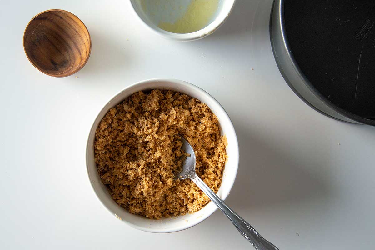Bowl with combined graham cracker crust mixture