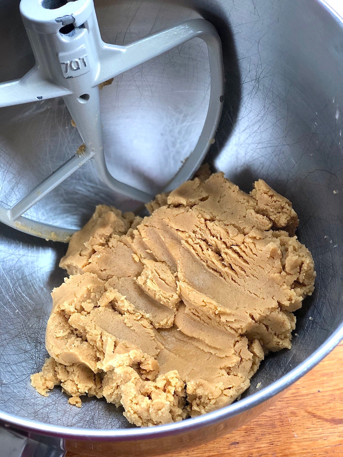 Peanut butter cookie dough in a mixing bowl.