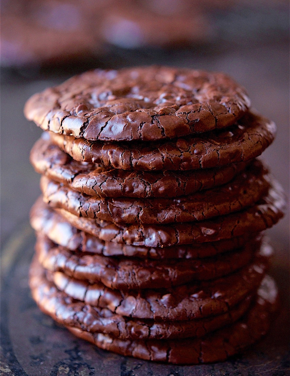 Flourless Fudge Cookies stacked one atop the other.