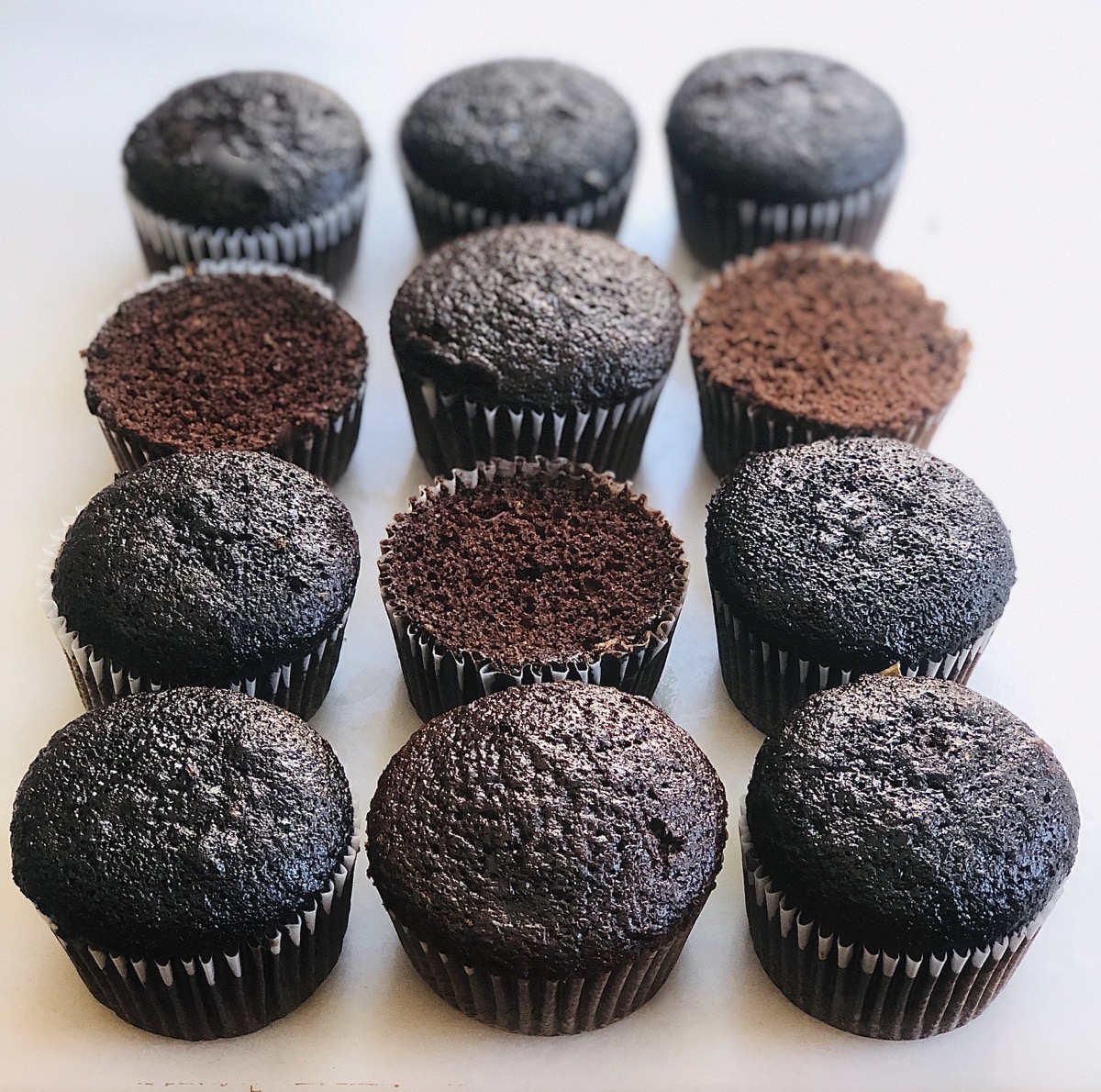 Cupcakes baked with natural cocoa, Dutch-process cocoa, and a combination.
