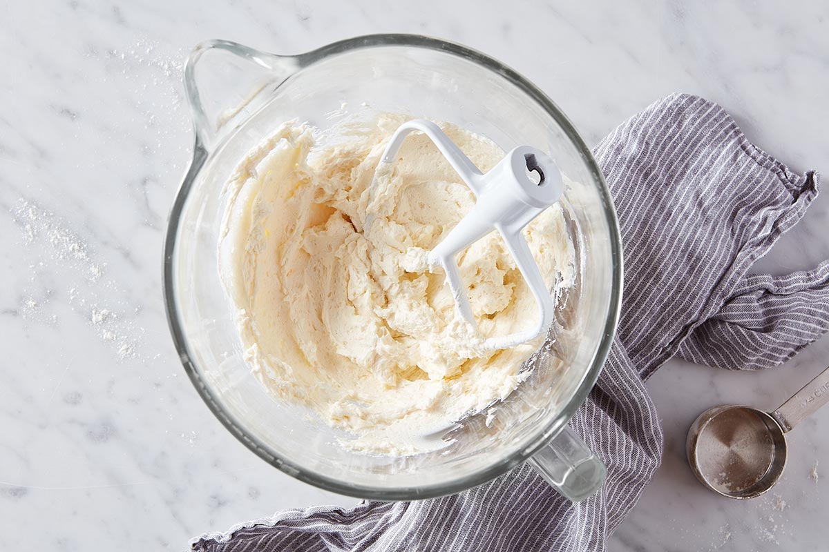 A mixing bowl filled with fluffy ermine icing (cooked flour frosting)