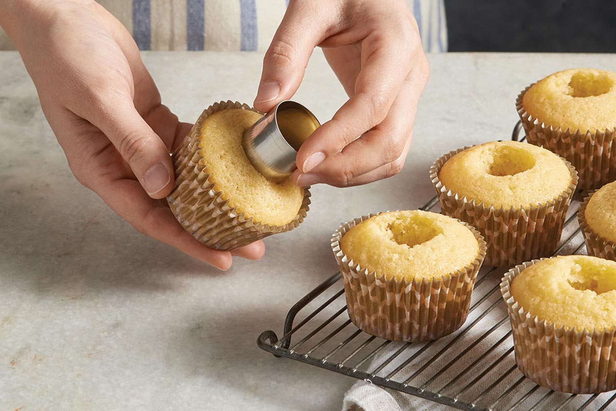 Vanilla cupcakes with cores cut out of the center