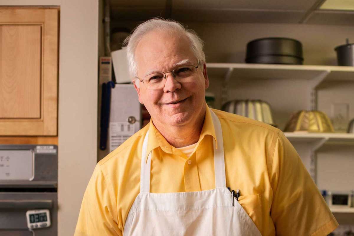 Frank standing in the kitchen