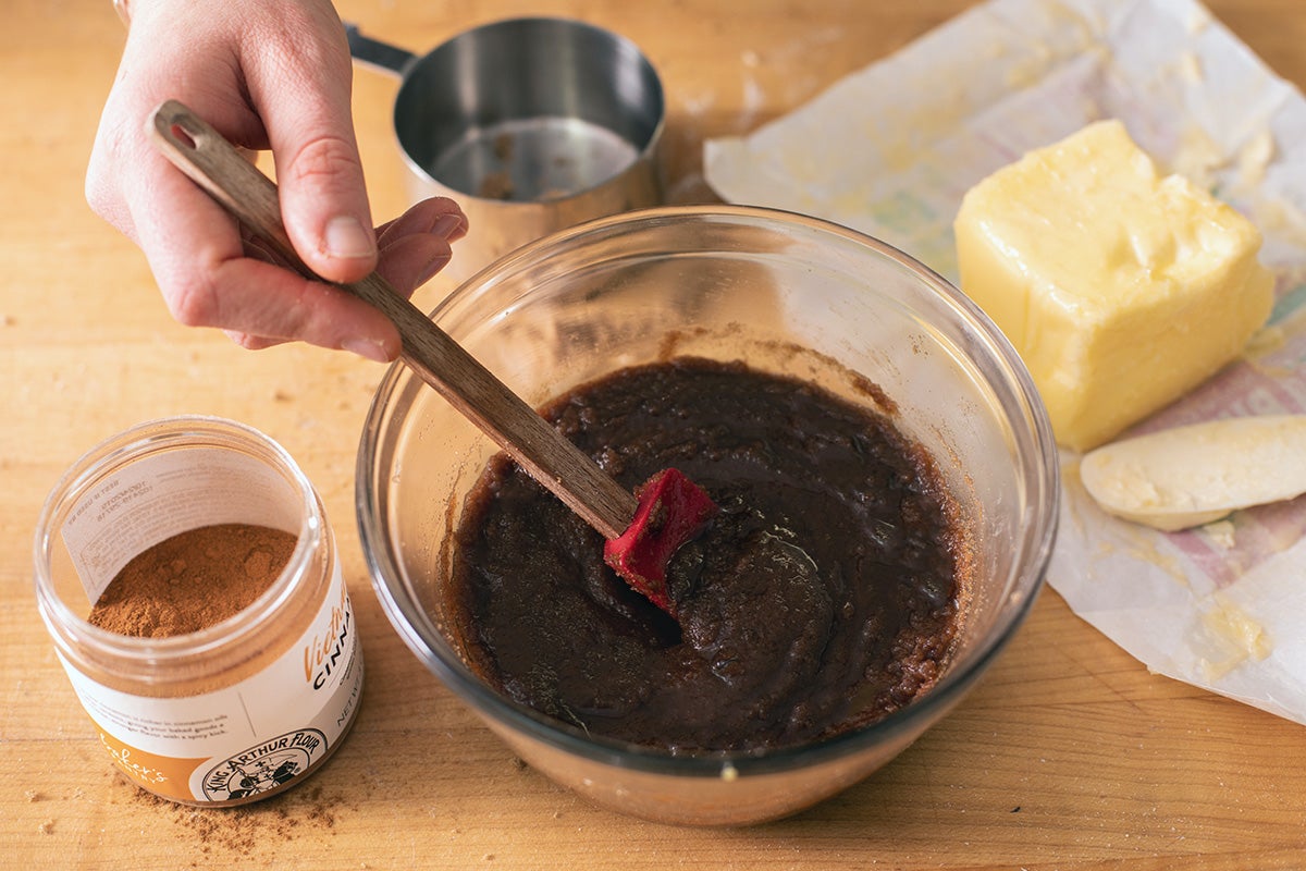 The cinnamon filling mixed together in a small bowl, ready to sprinkle on top of the dough