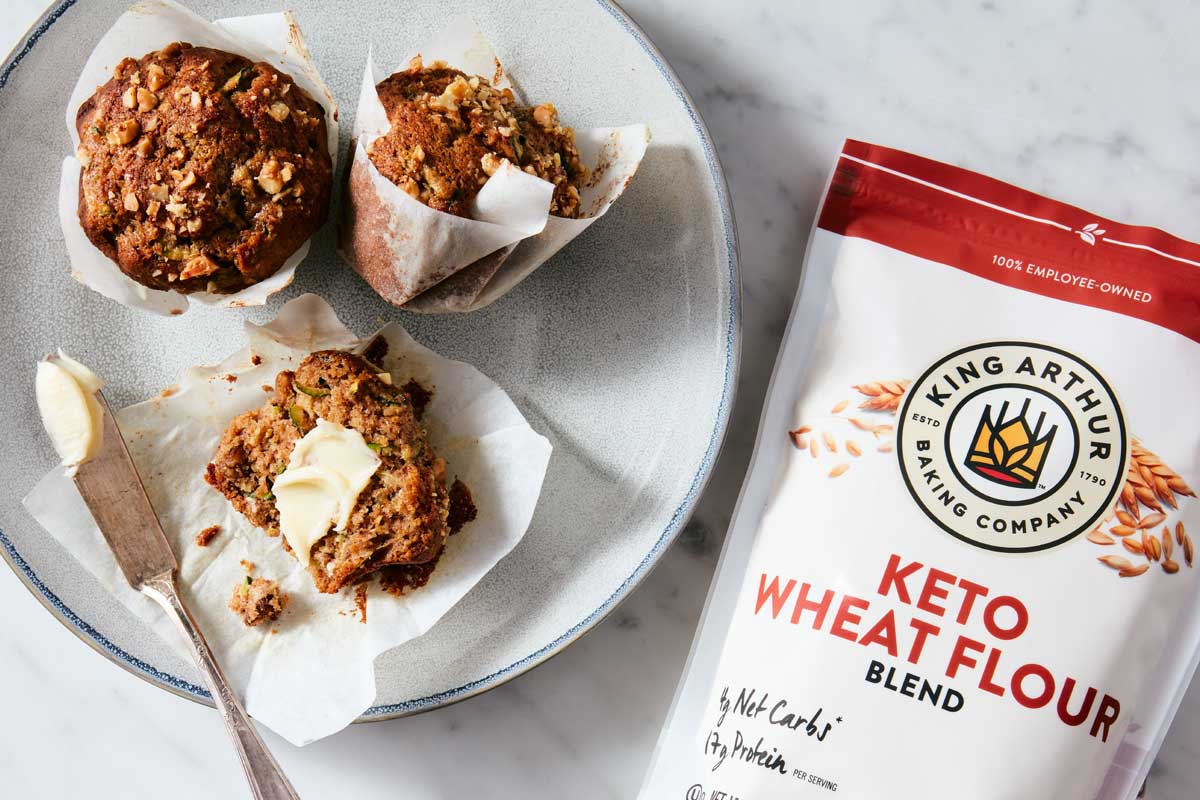 Bag of Keto Wheat Flour next to muffins
