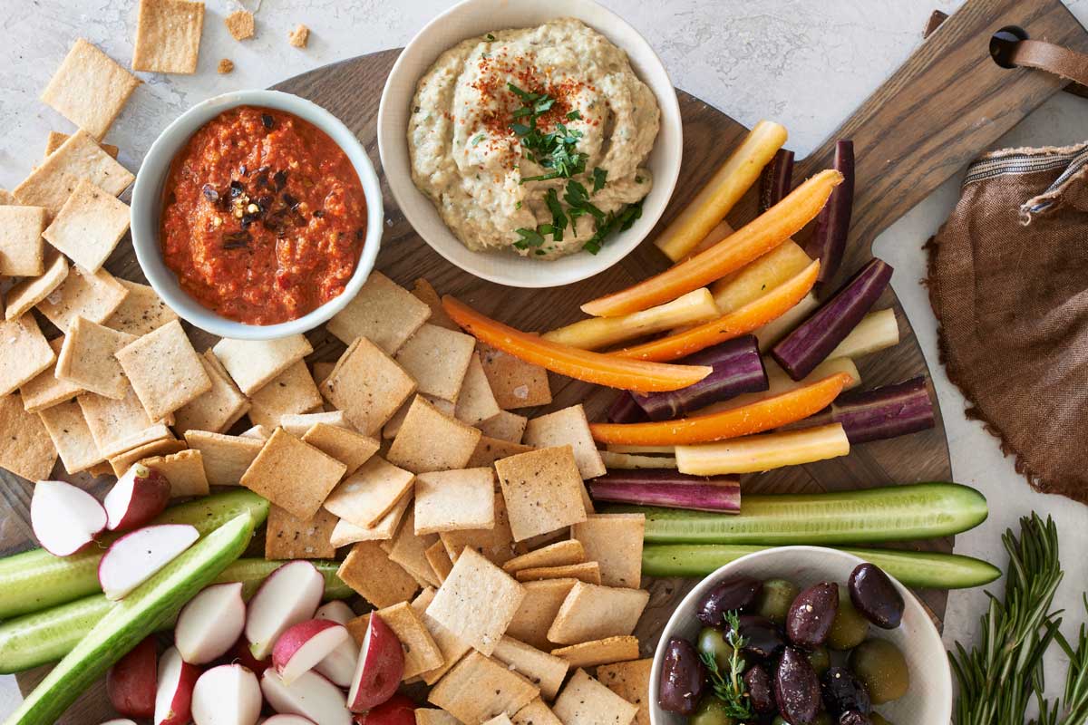 Paleo crackers and vegetables spread