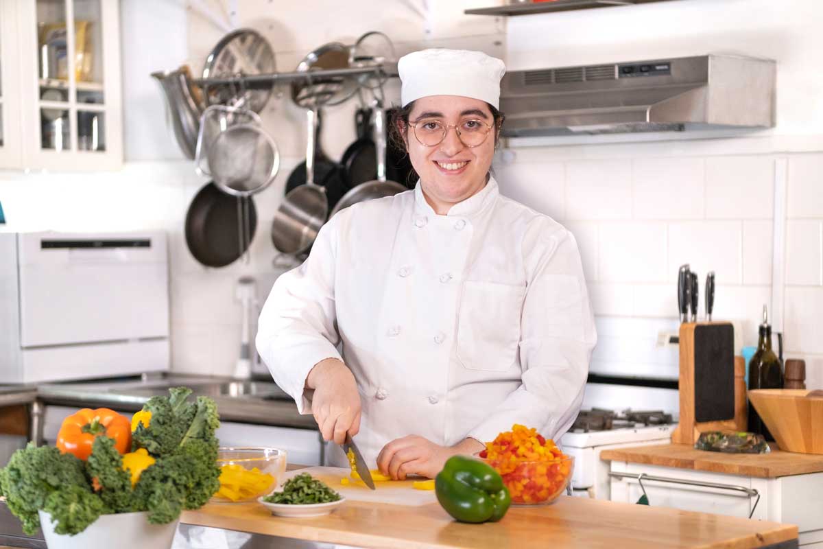 Hadar working in the kitchen