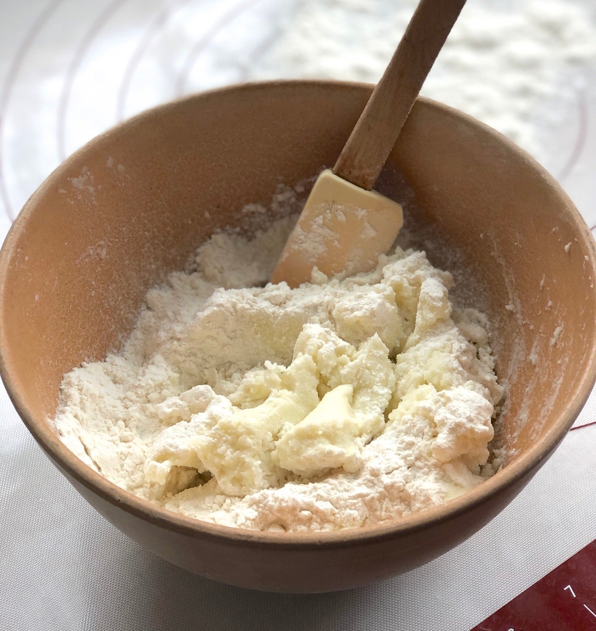 Lefse ingredients in a bowl being stirred together.