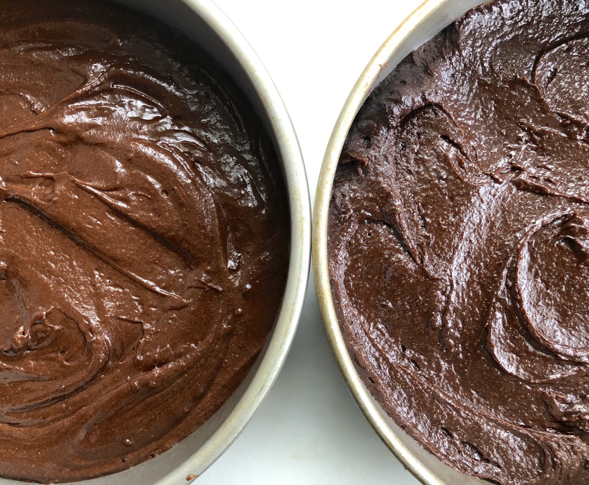 Two round cake pans of brownie batter side by side, one made with Baking Sugar Alternative, one with regular granulated sugar.