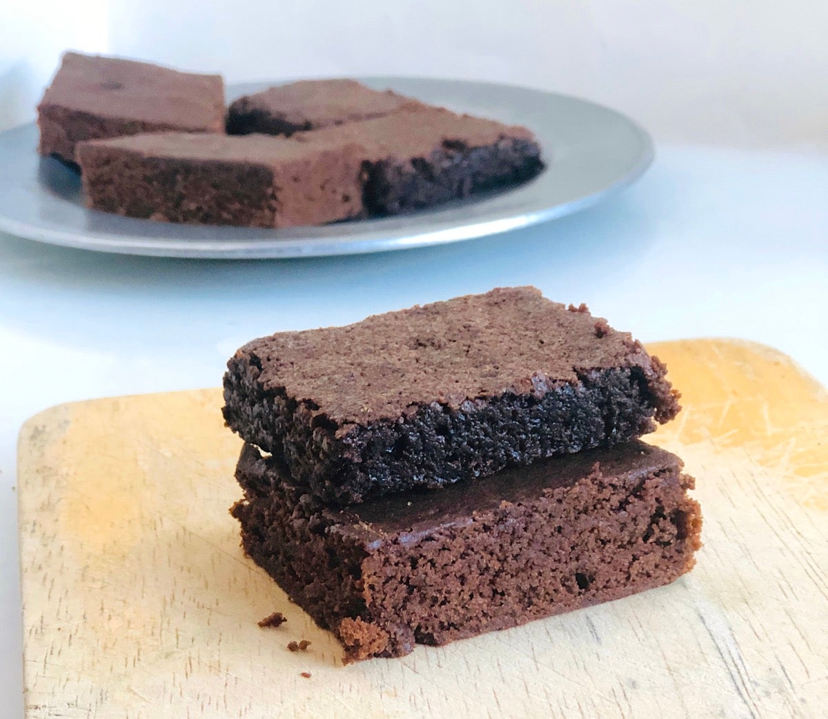 Two brownies, one made with Baking Sugar Alternative, one with regular cane sugar.