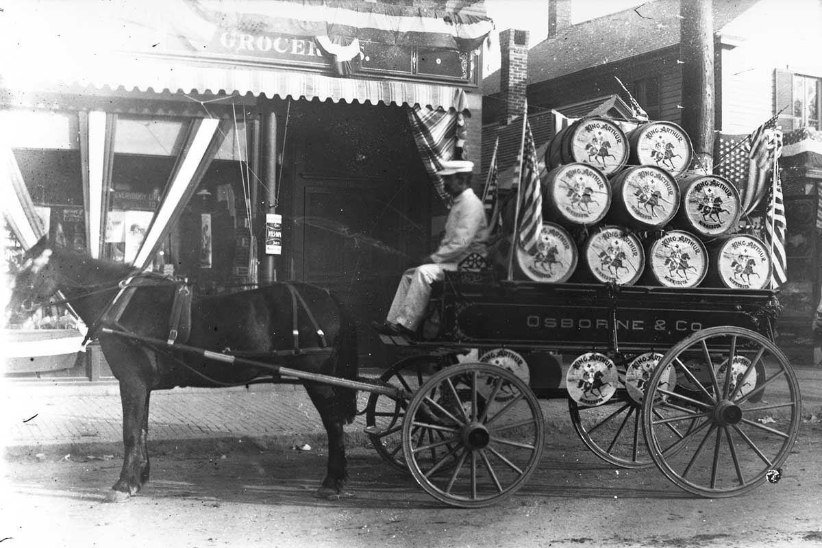 King Arthur flour barrels on horse-drawn buggy