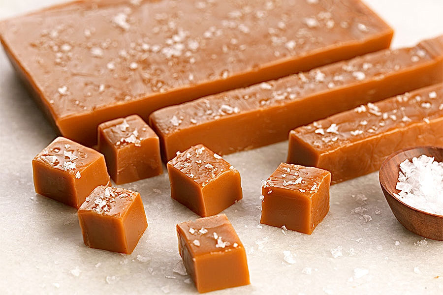 A block of homemade caramels with sea salt sprinkled on top