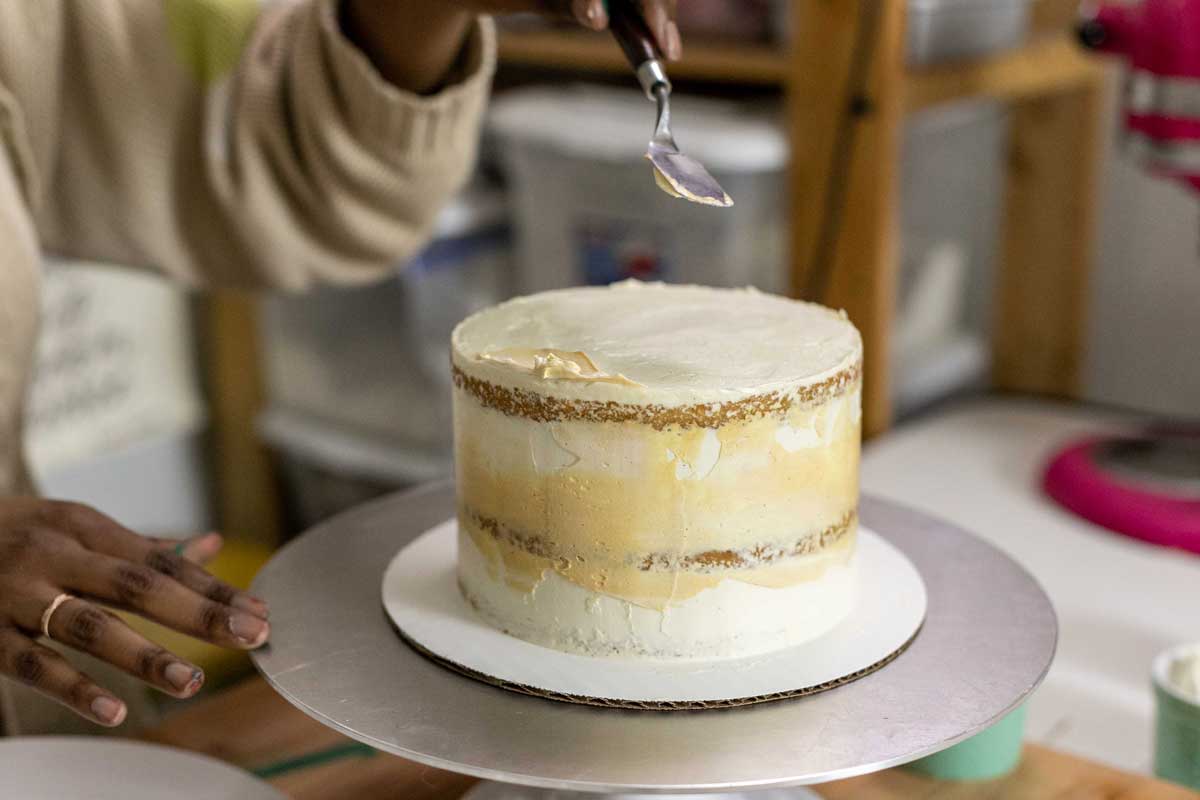 Smear of ivory color on top of cake