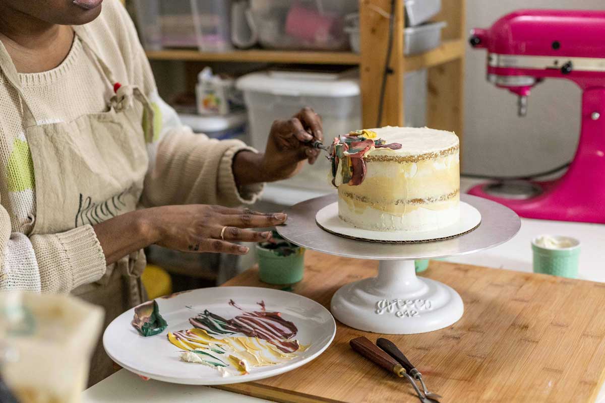 Cake covered with colored smears of frosting