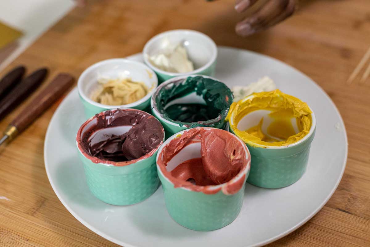 Bowls of colored buttercream