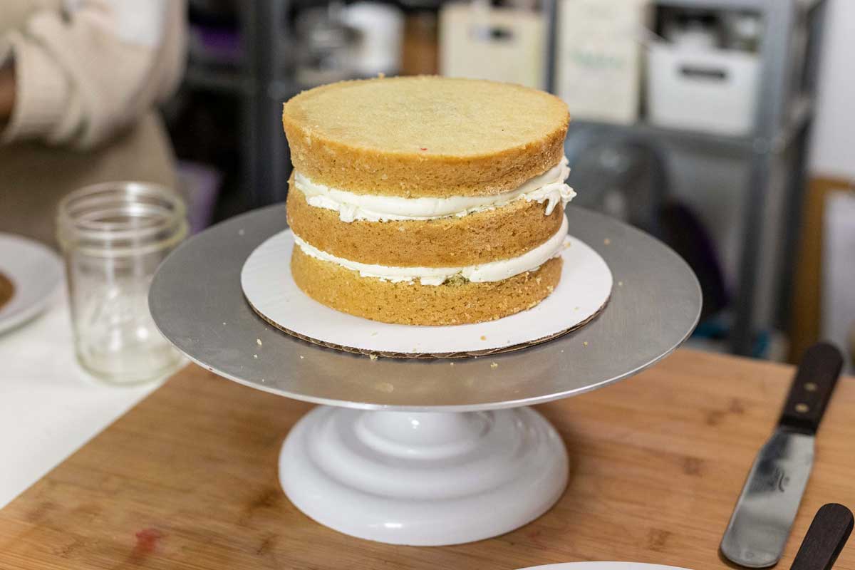 Cake with all three layers stacked and filled