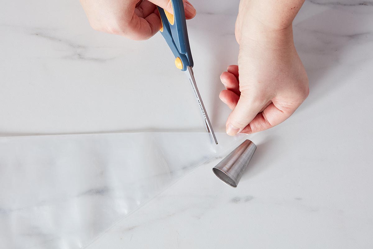 Point out spot to cut pastry bag